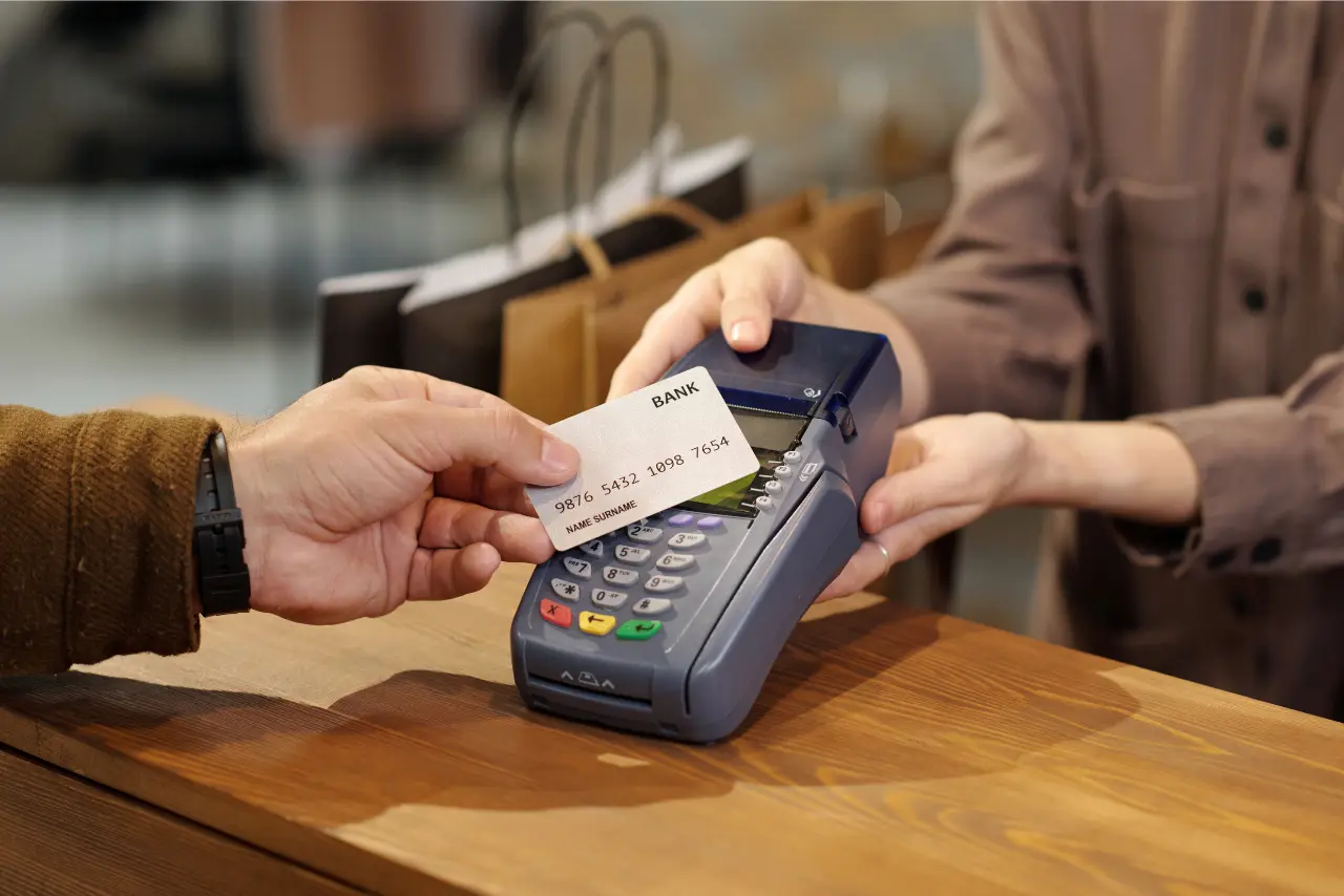 Retail customer paying a subscription with credit card in Singapore